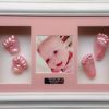 7- baby hands & feet casting, pink hand cast foot cast white frame white ba