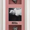 68- silver hand and foot, white frame, pink backing