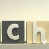 Grey & pale yellow name blocks with white letters